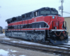 Black, red, and white diesel locomotive