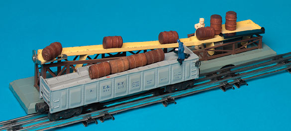 A fully assembled barrel loader and barrel car on tubular track.