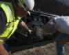 Two workers looking at big boy