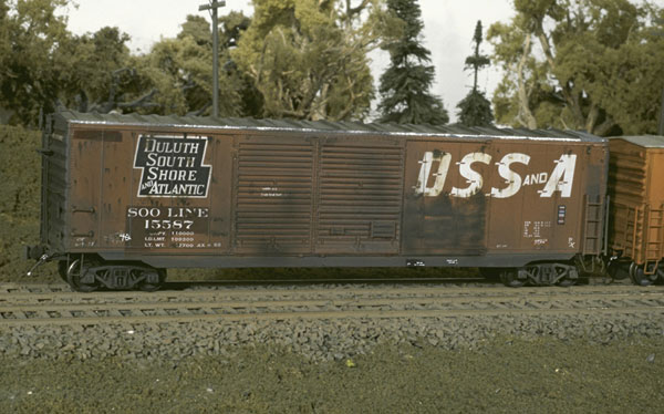 Finished model. By using weathering techniques and making some minor modifications, author Bob Rivard transforms an HO scale InterMountain model into the well-worn freight car shown.