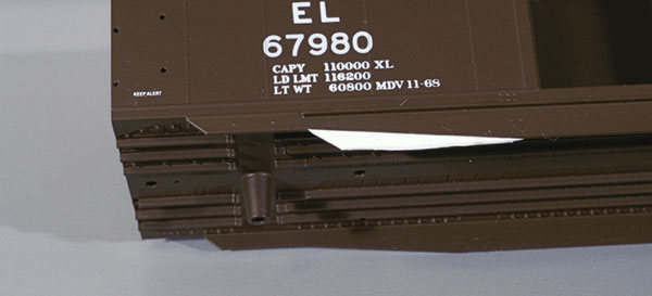 Sill modifications. Add styrene filler pieces to modify the car’s side sills.