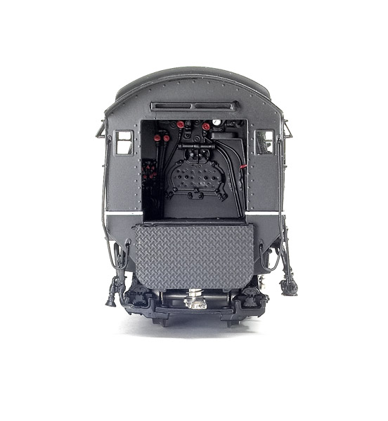 The cab features painted valves and gauges and a hinged cab apron.