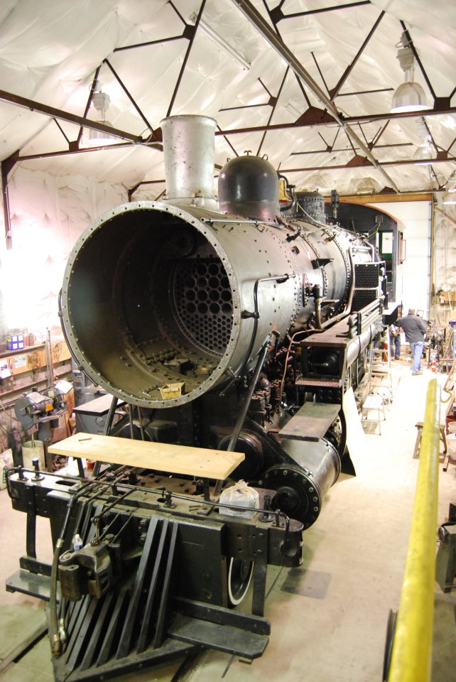 Steam locomotive inside shop facility for restoration work. Northern Pacific No. 1364 runs again after 73 years.