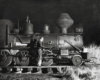 A closeup shot of a guy working on a train