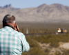 A picture of someone taking a picture of big boy passing by