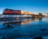 A train traveling over an icy bridge