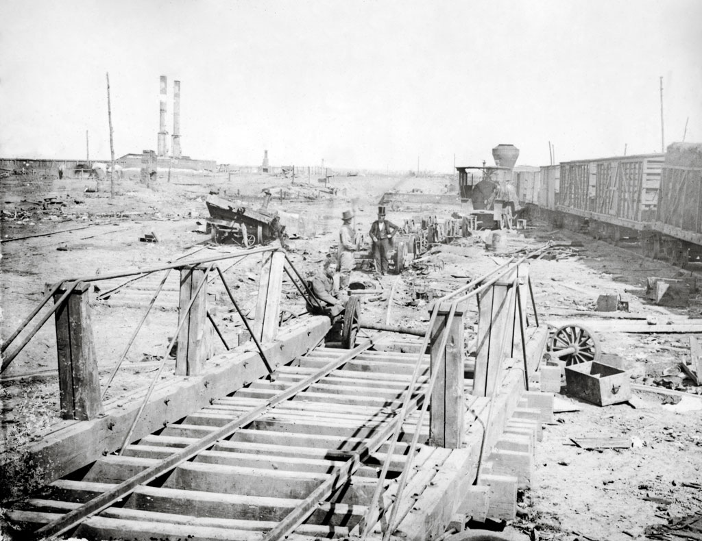 black and white photo of building a bridge
