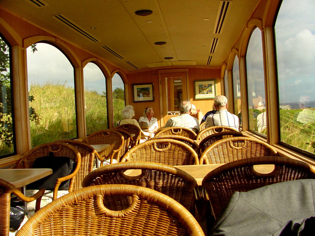 The open-air top deck of St. Kitts Scenic's railcar