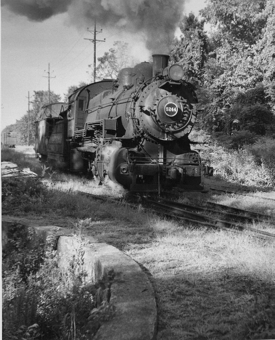 Steam locomotive with caboose