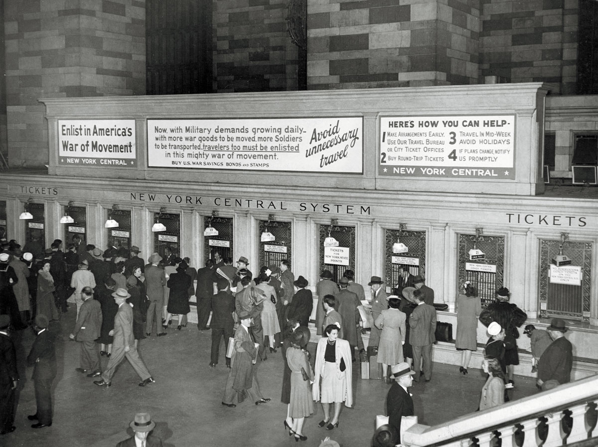 People buying tickets inside the grand central station