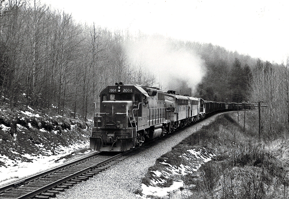 A black and white photo of Clinchfield GP38 coming down the tracks