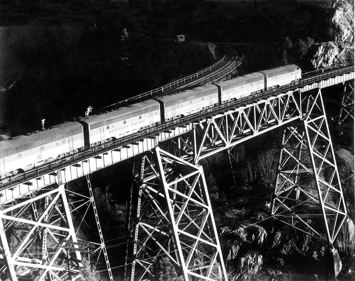 Five diesel locomotives on steel viaduct