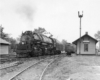 A train parked outside a station