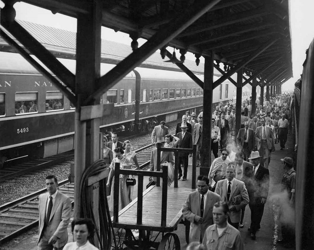 numerous passengers at a passenger station