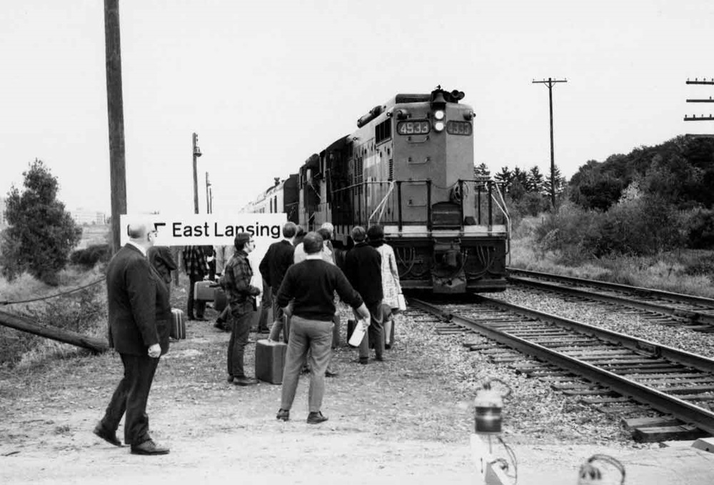 people waiting for a gt passenger train