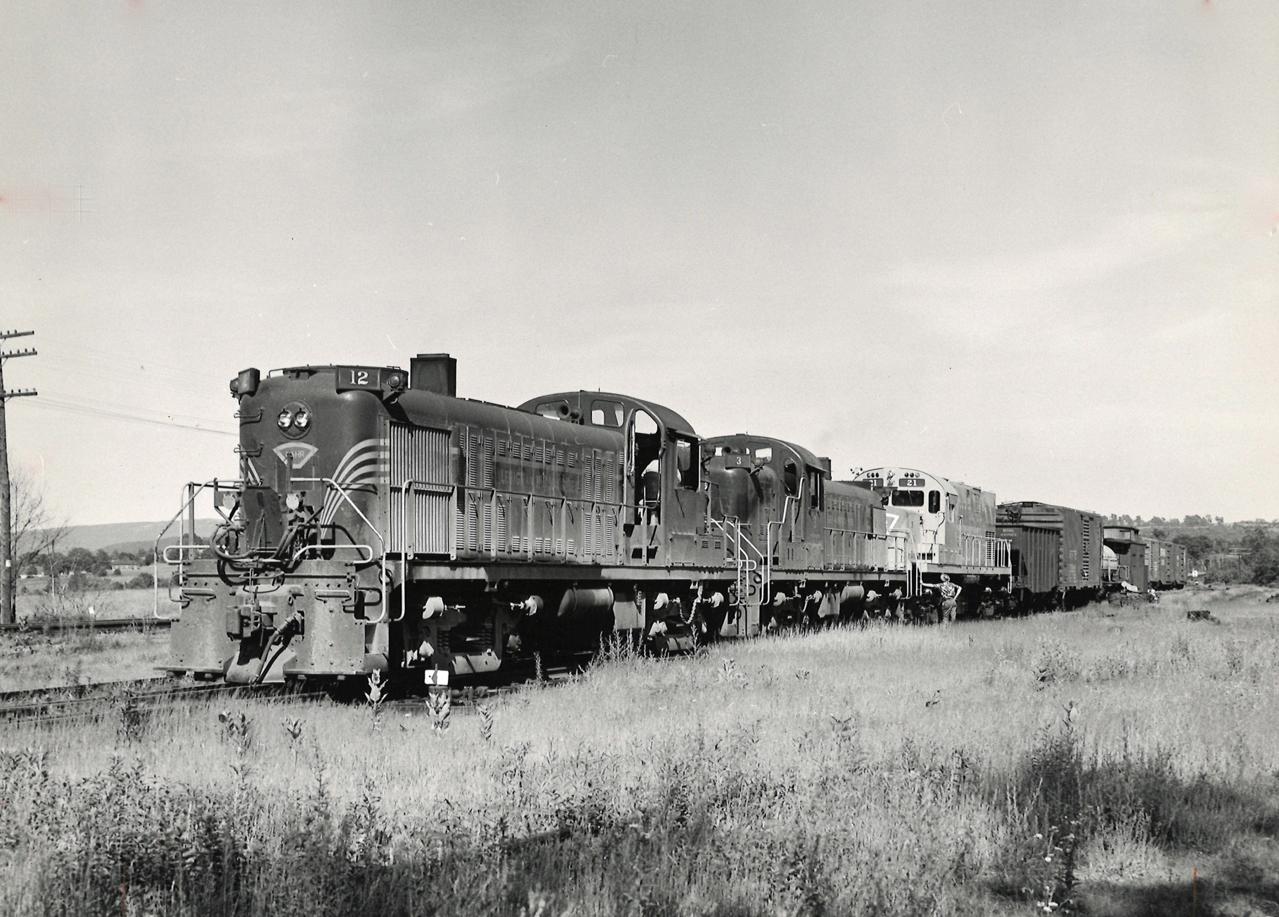 Lehigh & Hudson River diesel locomotives with freight train