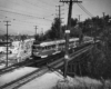 Two connected PCC-style electric streetcars.