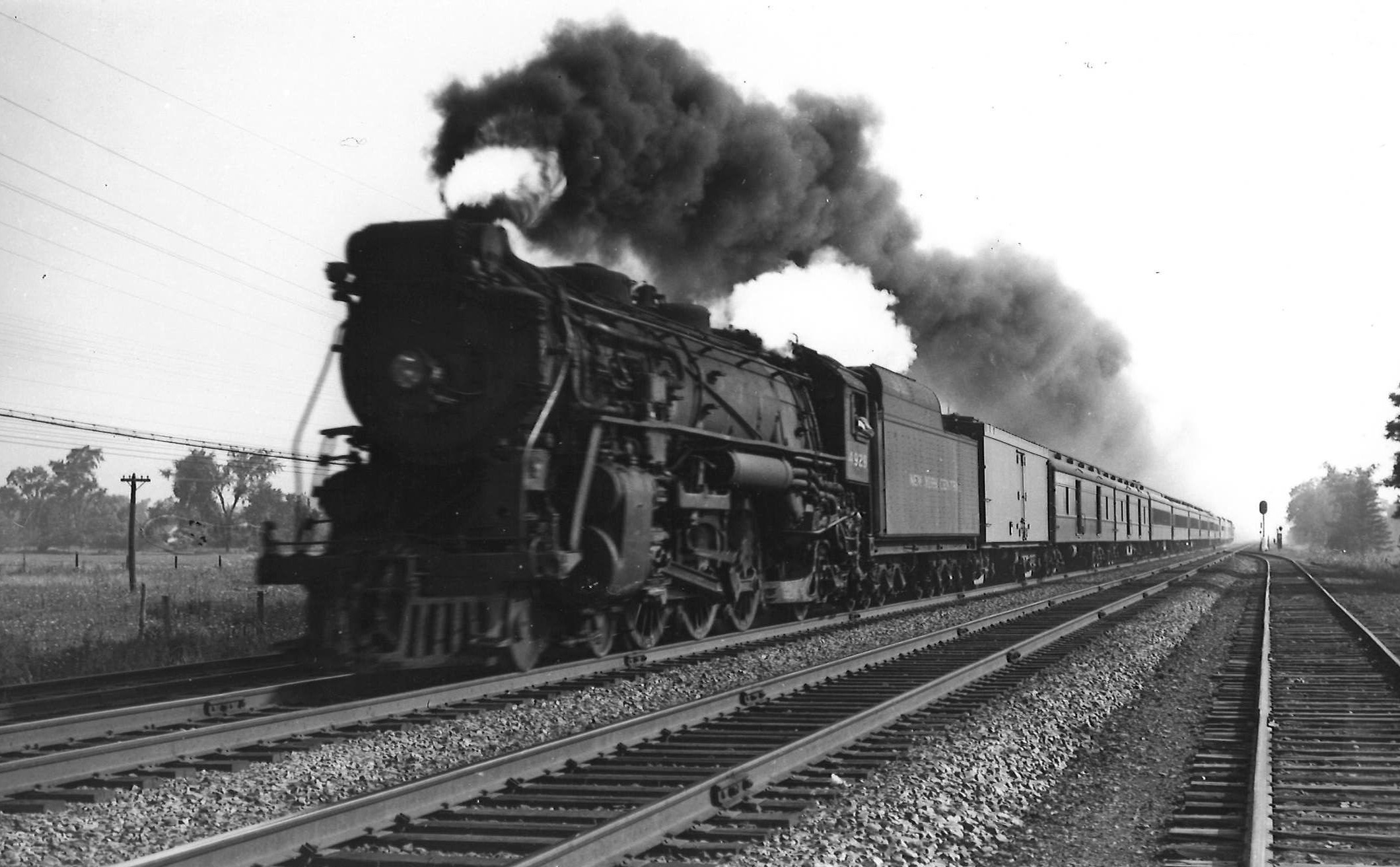Canadian Pacific 4-6-2 steam locomotive with long passenger train