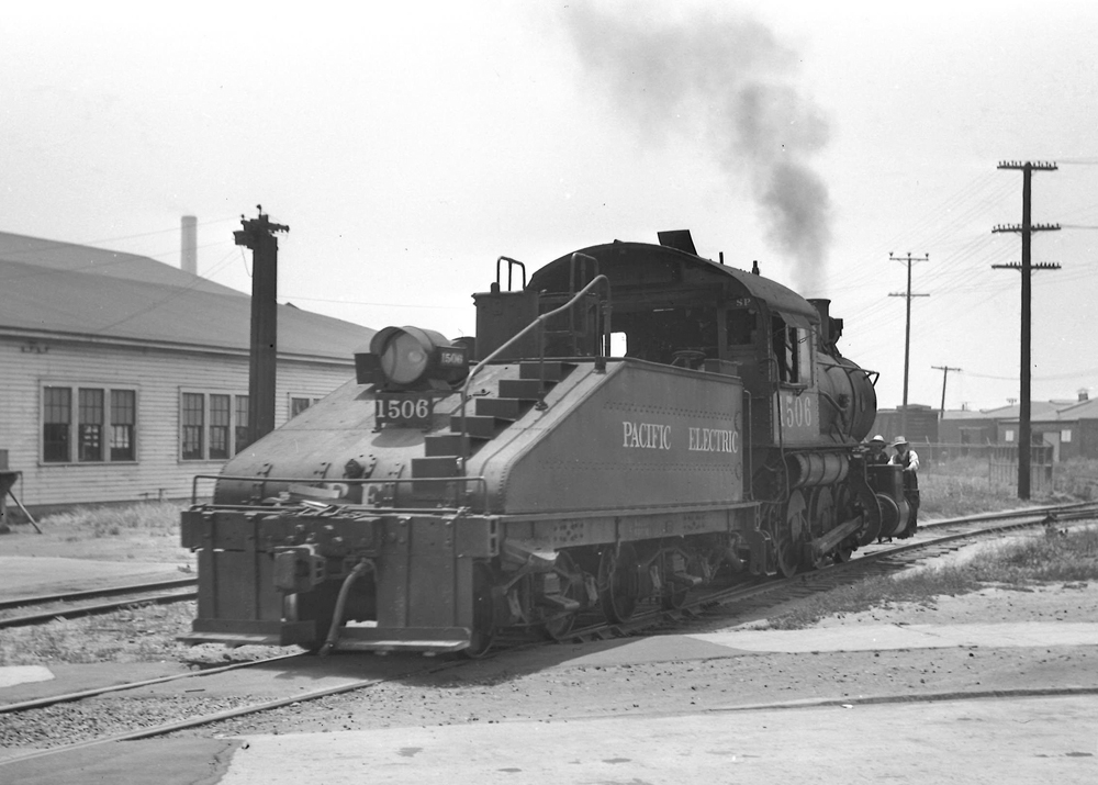 An 0-6-0 steam locomotive switch engine with slope back tender.