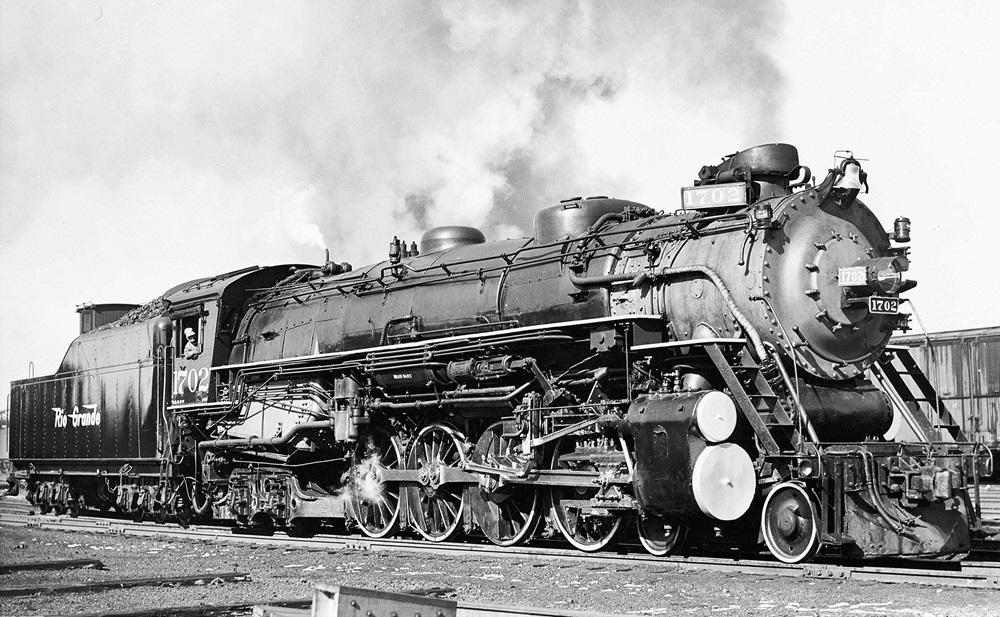 Side view of a clean 4-8-4 steam locomotive.