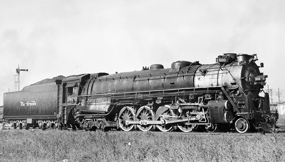 Side view of a 4-8-4 steam locomotive.