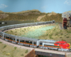 A sweeping photo of a silver-colored HO Scale Sante Fe streamlined passenger train pulled through a desert Southwest scene.