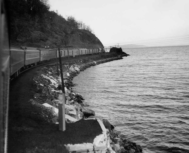 Alco road-switchers with New York–Montreal Laurentian along Lake Champlain, fall 1953.