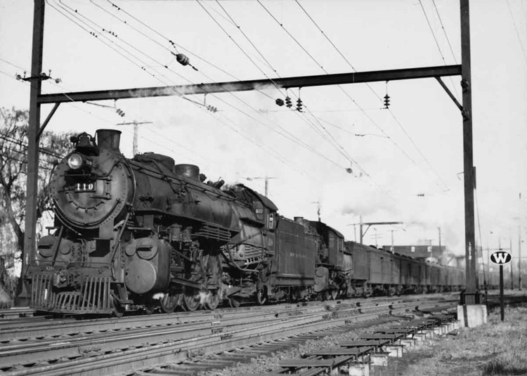 Pacific and Ten-Wheeler with Bethlehem–Philadelphia Interstate Express, with through cars from Buffalo, Rochester, and Syracuse, passing YM interlocking at Glenside, Pa., 1940s.
