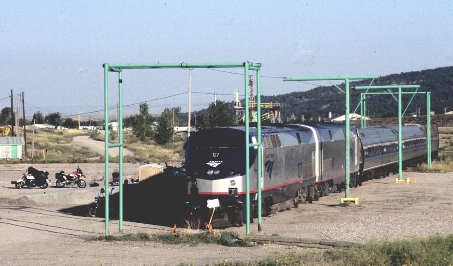 Amtrak train parked on a siding.
