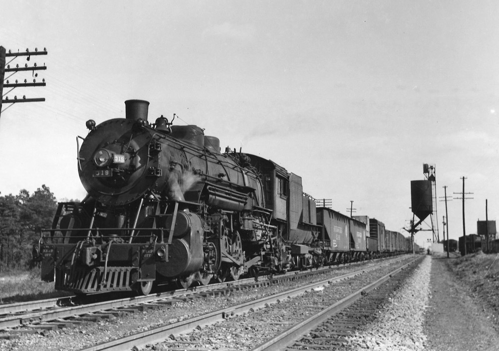 Steam locomotive on freight train