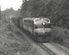 Streamlined diesel locomotives with freight train