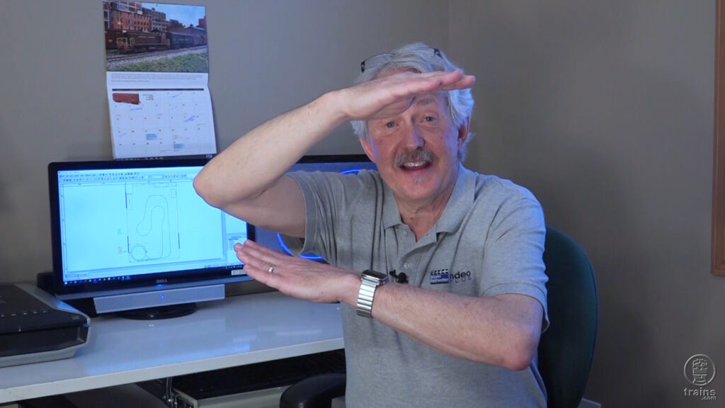 Gerry Leone sitting at his computer desk