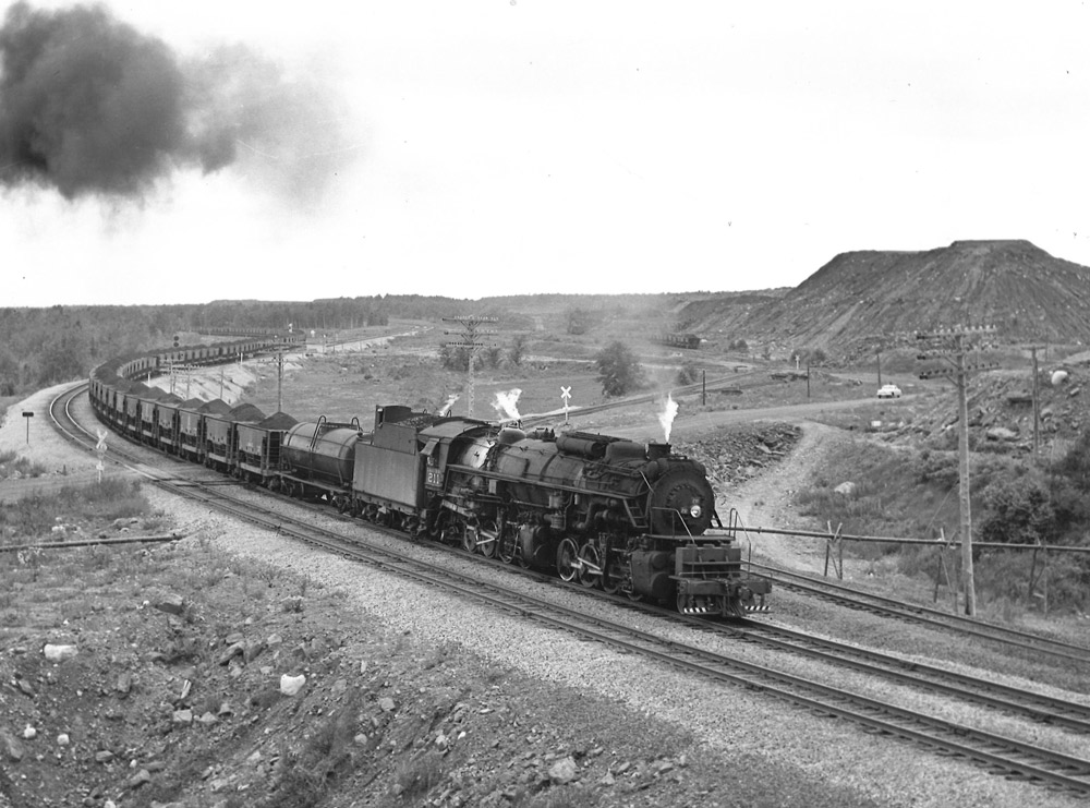 Articulated steam locomotives with freight train
