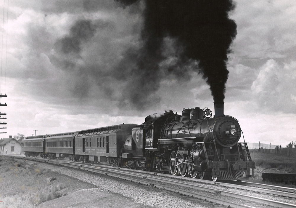 Steam locomotive with short passenger train