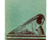 Green cover of a book featuring a streamlined steam locomotive illustration.