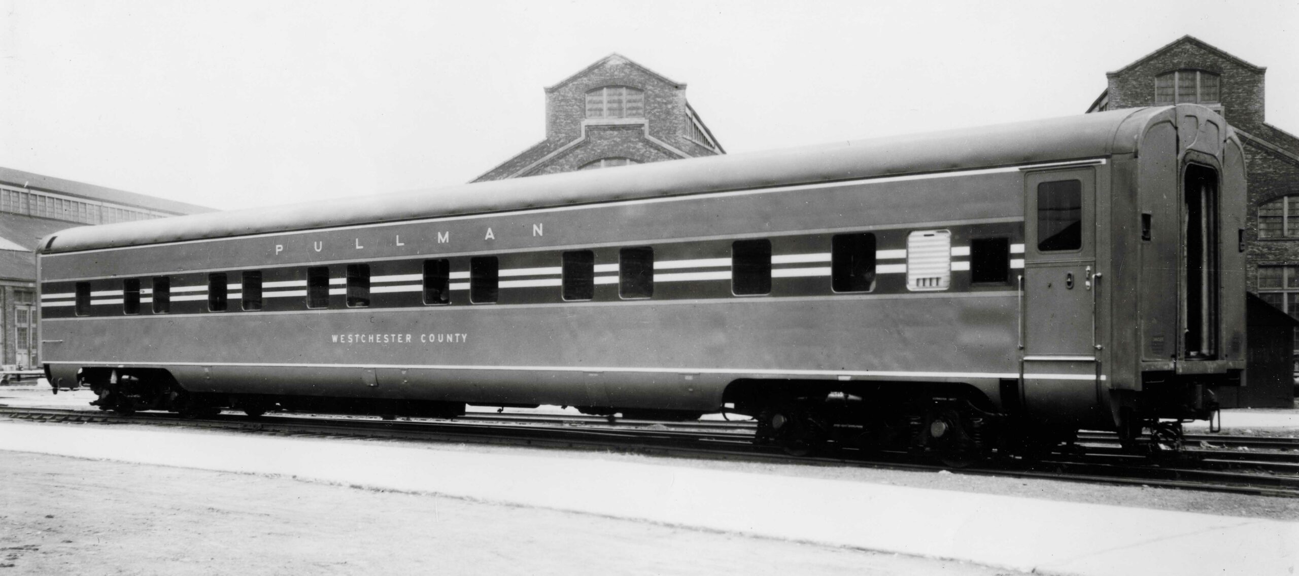 Streamlined passenger car broadside image.