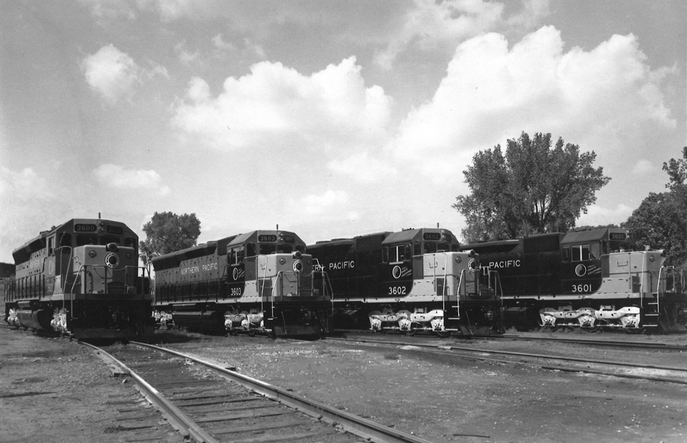 Four road-switcher diesel locomotives