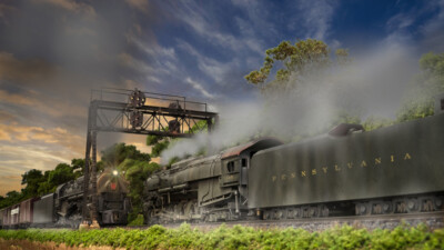 Steam-powered freights, a streamlined passenger train, and more model railroad photos