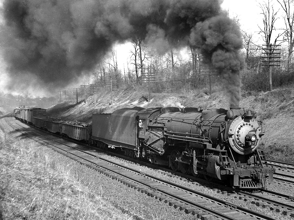 Steam locomotive with freight train