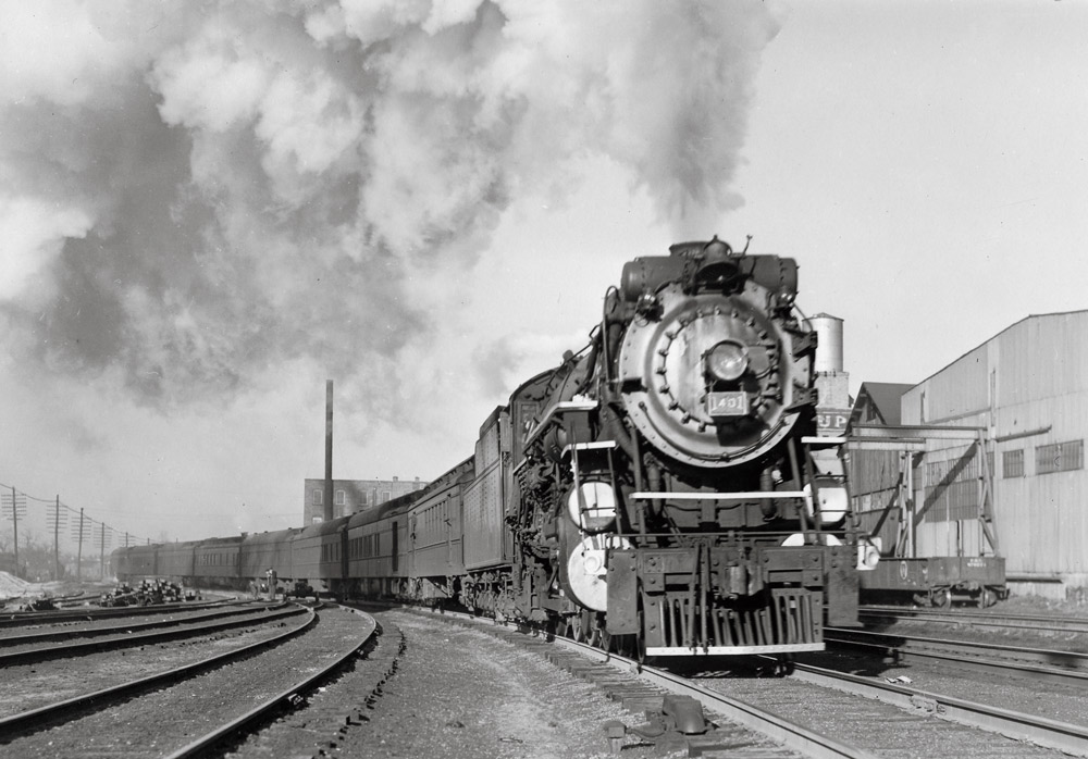 Steam locomotive with passenger train