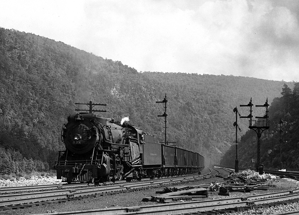 Steam locomotive with freight train