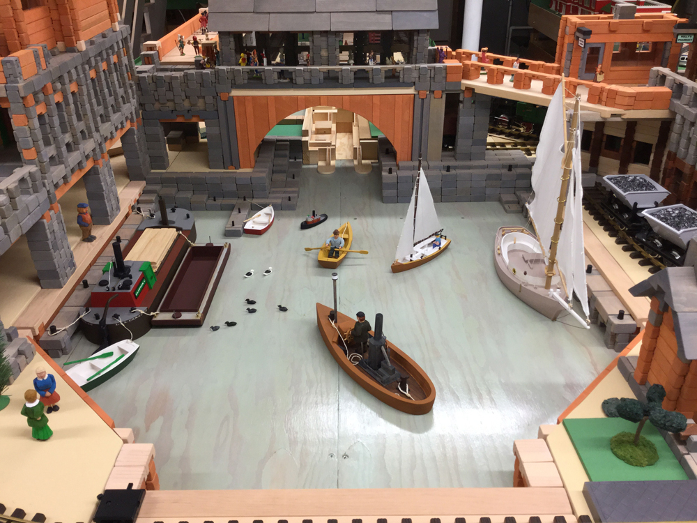 Indoor large-scale layout with boat harbor