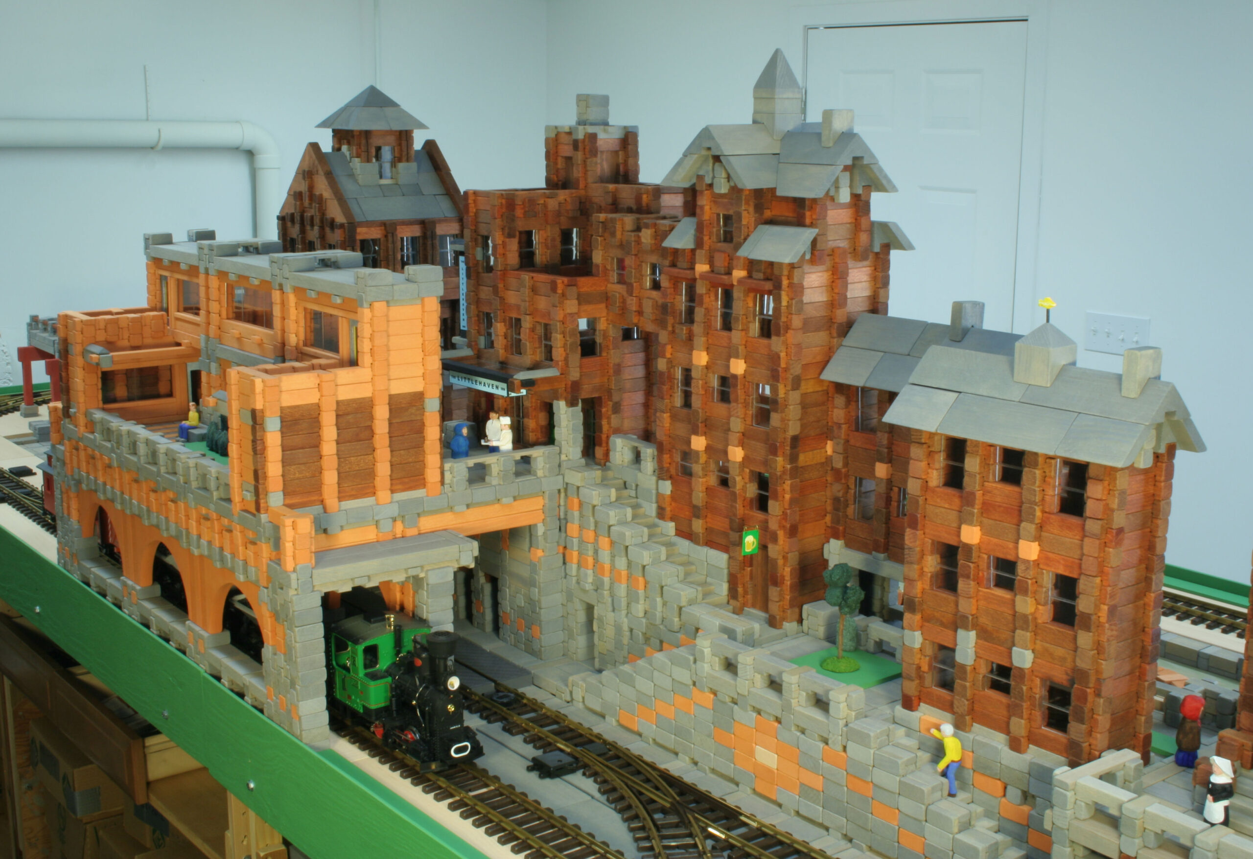 Backside of a city scene on a large-scale railway built of wooden blocks