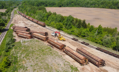 Distinctive Canadian grain hoppers near end of the line