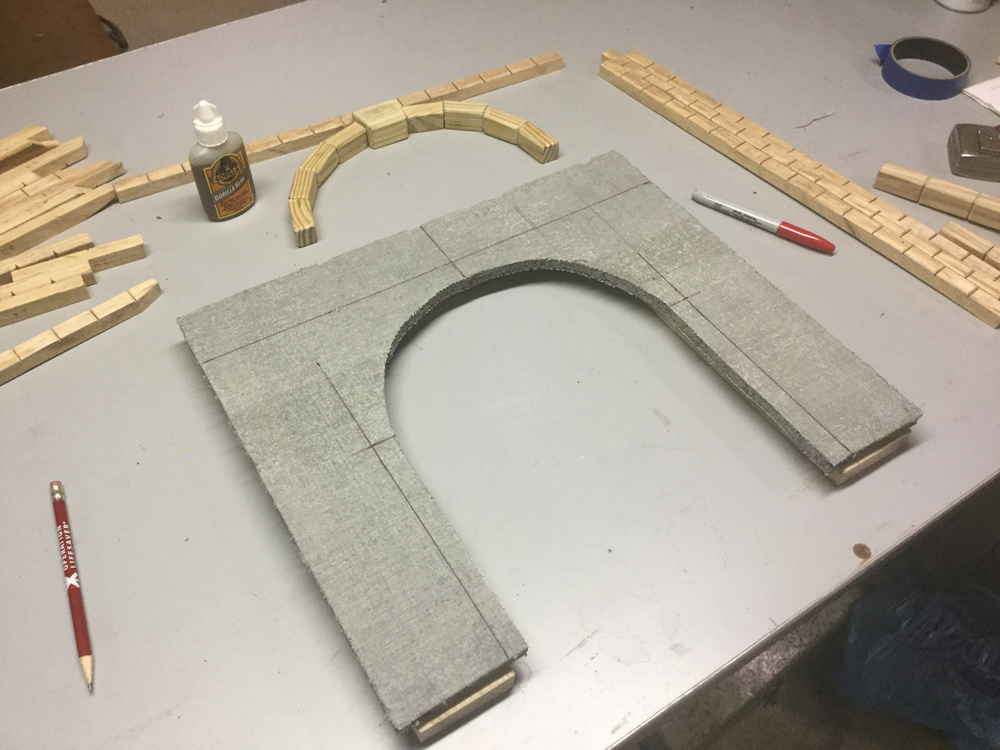 Tunnel portal frame on a workbench