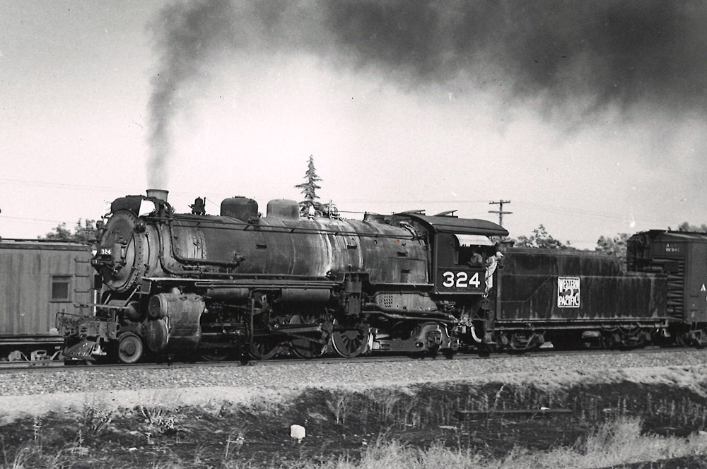 Black-and-white view of 2-8-2 steam locomotive