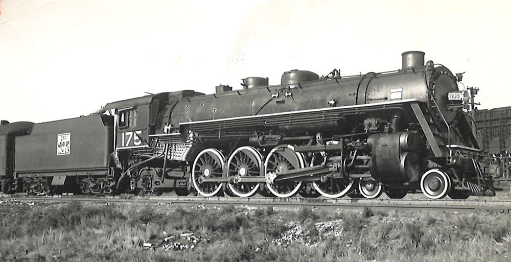 Black-and-white broadside view of 4-8-2 steam locomotive