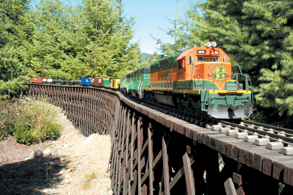 Model train on a wood trestle