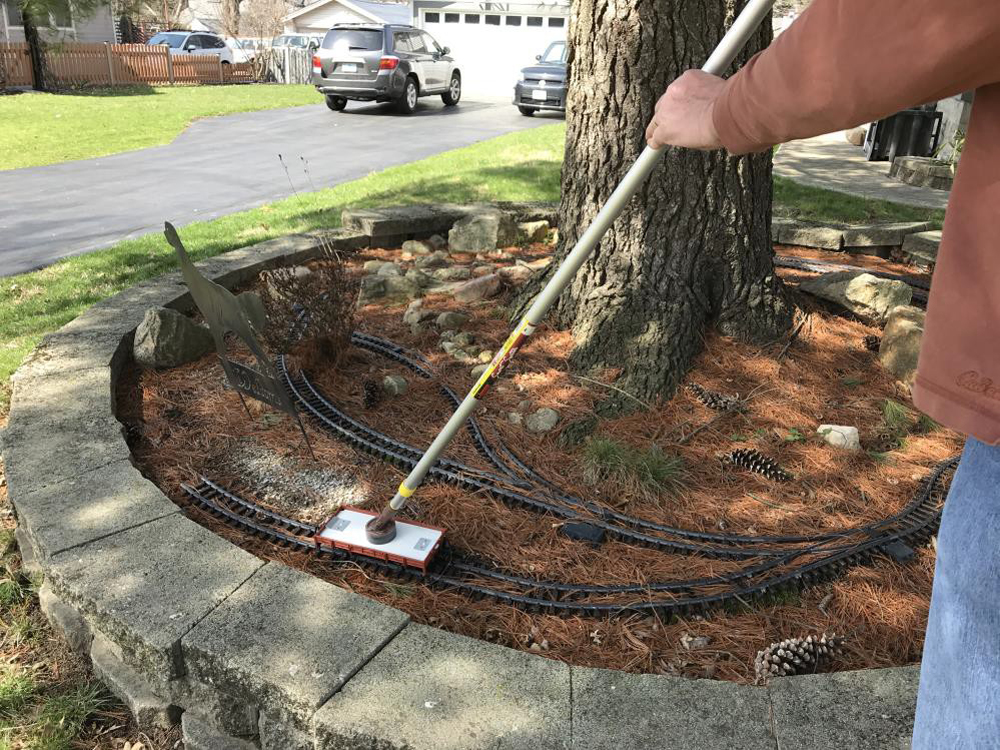 A track cleaner on a pole