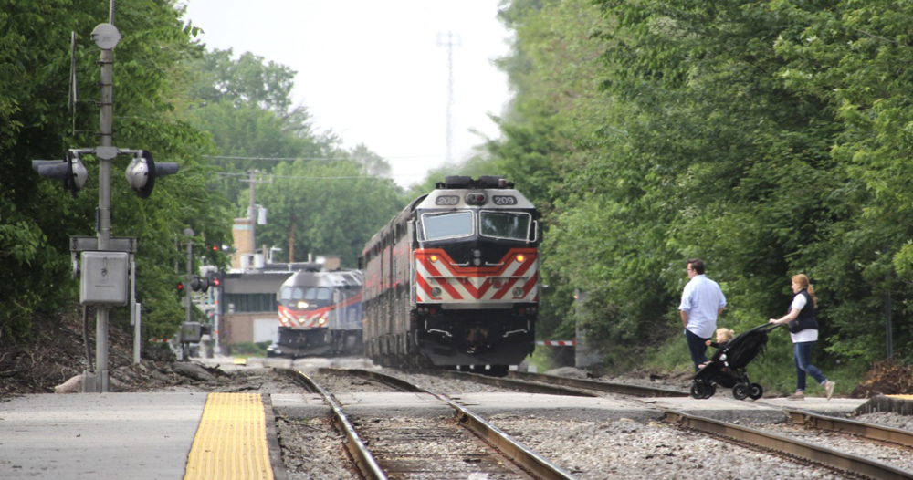 Trains prepare to meet on straight.